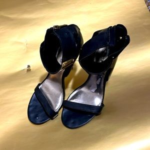 Pre owned Bebe Gold ankle black leather pumps